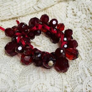 Red gold beaded bracelet large beads ribbon